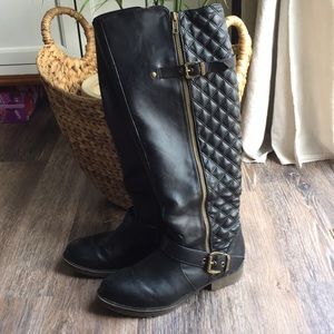 Tall black boots